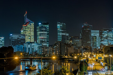 Night View of La Defense Business District Traffic Seine River and Bridge
