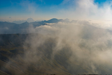 Mist Moving From Valley to Mountains Peaks in the French Alps During Sunrise