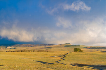 Blue and White Sky With Clouds Over French Aubrac Lowland at Sunrise