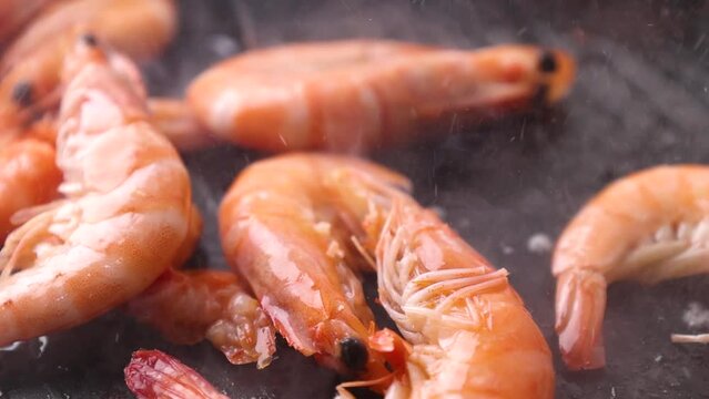 shrimp fall into the pan and fry  japan kitchen cooking asia seafood 
