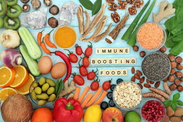 Immune system boosting food for a healthy life. Seafood, dairy, vegetables, cereals, fruit, medicinal herbs, spice. Foods high in antioxidants, smart carbs, fibre, lycopene, protein, vitamins, mineral