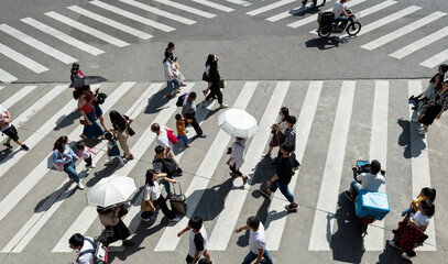 Group of people crossing the crosswalk