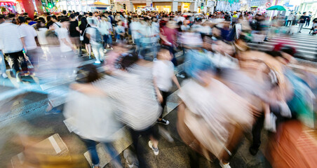 Crowd of people crossing the crosswalk