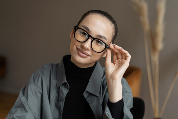 Manager with glasses portrait woman working in office formal stylish clothes