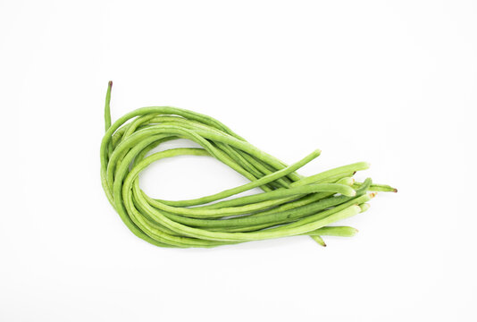 A bunch of yard long bean or picked cowpea isolated on white