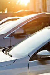 Fototapeta premium Defocused blur of cars parking in a row