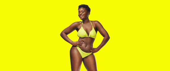  African American woman in bikini confident with her body