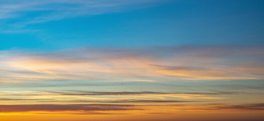 Naklejka na ściany i meble Scenic landscape of sunset sky above sea.