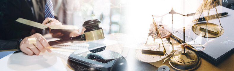 Business and lawyers discussing contract papers with brass scale on desk in office. Law, legal...