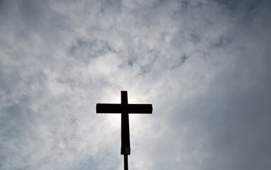 A cross under the dark sky