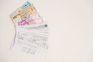 Hryvnia banknotes and payments for utilities for gas, electricity and water in Ukraine. Subsidies and benefits for the population.