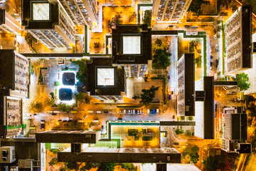 Aerial view from top. public housing in Sha Tin, Hong Kong at night, abstract view