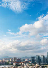 The city under cloud blue sky