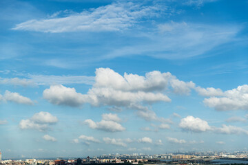 The city under cloud blue sky
