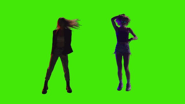 Two Girls dancing on greenscreen.