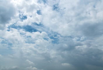 Blue sky covering with white cumulus