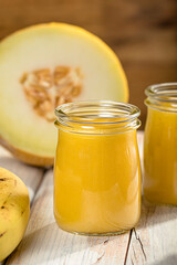pineapple and mango melon shake on white wood