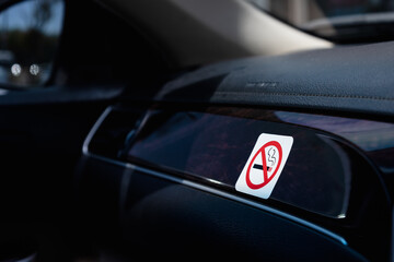 No smoking cigarette sign and symbol in car.