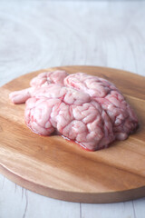 close up of mutton brain on a chopping board 
