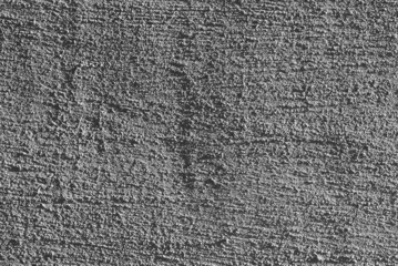 gray background. in the photo, gray decorative plaster on the wall.