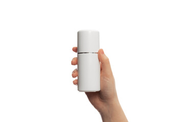 Studio image of female hand holding moisturizing cream bottle isolated over white studio background