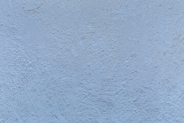 Old concrete wall worn cement background with abstract paint blue rough texture