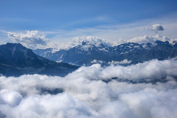 Fototapeta na wymiar Swiss Alps Above the Clouds