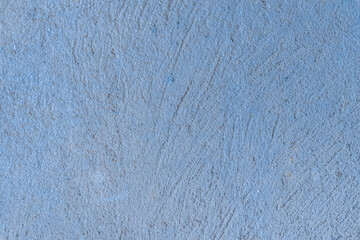 Old concrete wall worn cement background with abstract paint blue rough texture