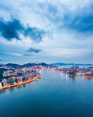 Naklejka na ściany i meble Epic Aerial view of Victoria Harbour, focus on the East side of Hong Kong Island
