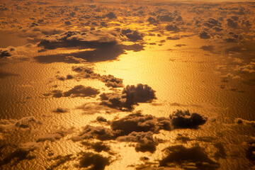 Sunset Clouds background and texture,  Clouds from airplane window