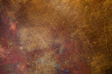 Orange-yellow copper surface flat close-up texture an full frame background
