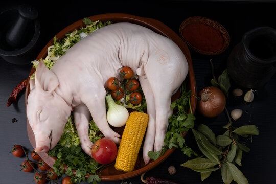 Preparaci&oacute;n cochinillo crudo