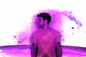 Young man in profile on colorful galaxy lights	background