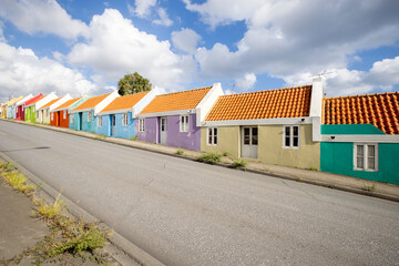 Small colorful houses along the road somewhere in Willemstad, Curacao