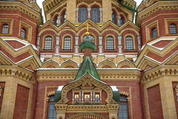 Fototapeta na wymiar Fragment of an old Cathedral of the Holy Apostles Peter and Paul. Peterhof, Russia