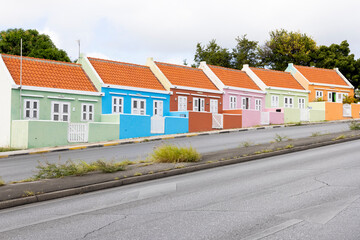 Small colorful houses along the road somewhere in Willemstad, Curacao