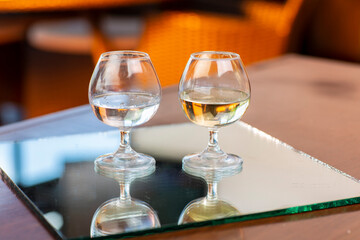 Two glasses of tequila.