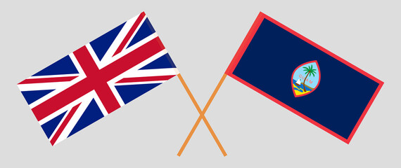 Crossed flags of United Kingdom and Guam. Official colors. Correct proportion