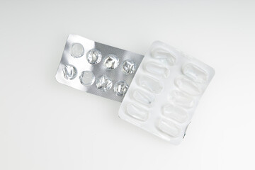Blister packings from pills on a white background. Empty bliser. Blister of tablets.
