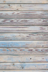 background: wooden planks in blueish, brownish and greenish colors