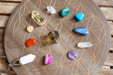 Healing crystals on brown background