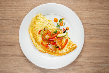 omelet with fresh vegetables, top view