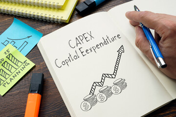 CAPEX capital expenditure is shown on the photo using the text - obrazy, fototapety, plakaty