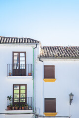 white houses in the street of the town of Ronda