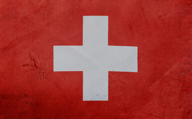 Obraz premium Closeup of grunge Swiss flag