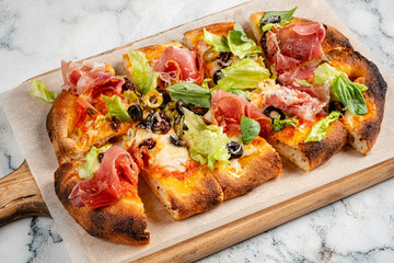 italian pizza on the wooden board