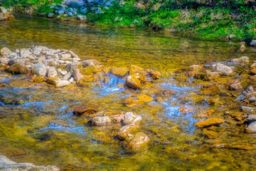 Mountain river during cloudy day.
