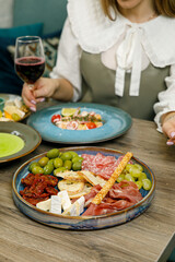 Italian cold snacks on a wooden table
