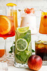 assorted cocktails on a wooden table
