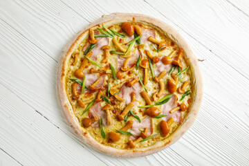 Italian pizza on a white wooden table
